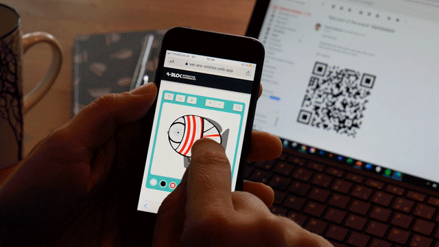 Die Teilnehmer malen auf Papier oder auf ihrem Smartphone ein Modell aus, das auf einem digitalen Bildschirm zum Leben erwacht.